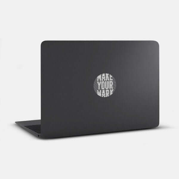 spaceblack Make Your Mark reusable macbook sticker tabtag on a laptop