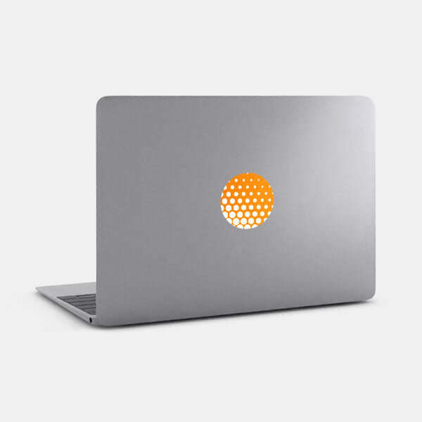 neon orange dot pattern 1 reusable macbook sticker tabtag on a laptop