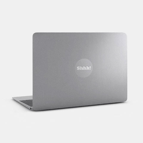 spacegray with silver "Shhh" reusable macbook sticker tabtag on a laptop