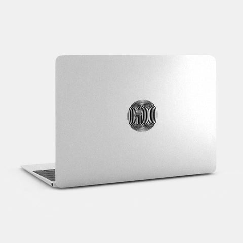 silver "go" reusable macbook sticker tabtag on a laptop