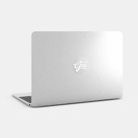 silver "gut" reusable macbook sticker tabtag on a laptop