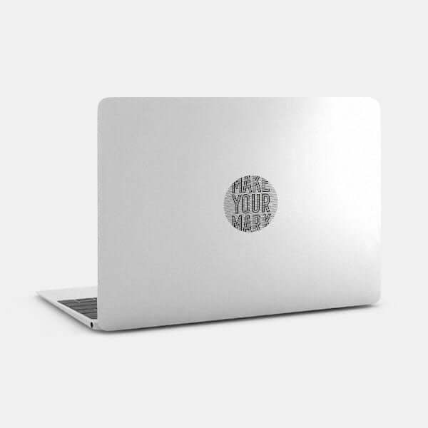silver Make Your Mark reusable macbook sticker tabtag on a laptop