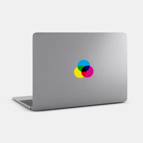 colorful "cmyk" reusable macbook sticker tabtag on a mac
