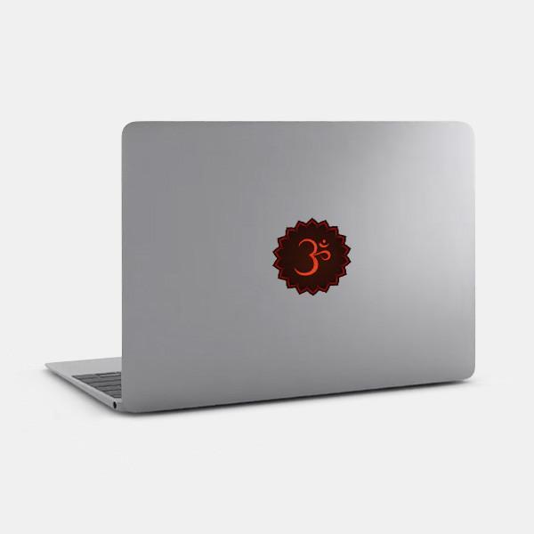 black om tabtag reusable macbook sticker tabtag on a laptop