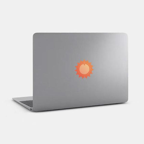 orange colorful "pinion d2 15"  reusable macbook sticker tabtag on a mac