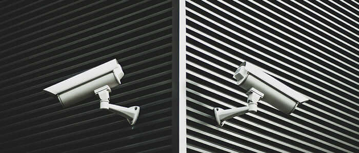 surveillance cameras at the corner of a building, Why Physical Privacy Matters