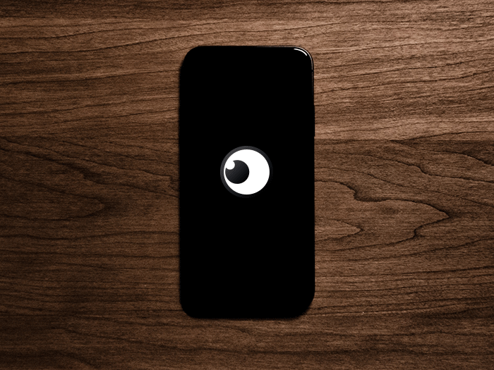 Should you cover your cameras? Eye on phone looking left and right