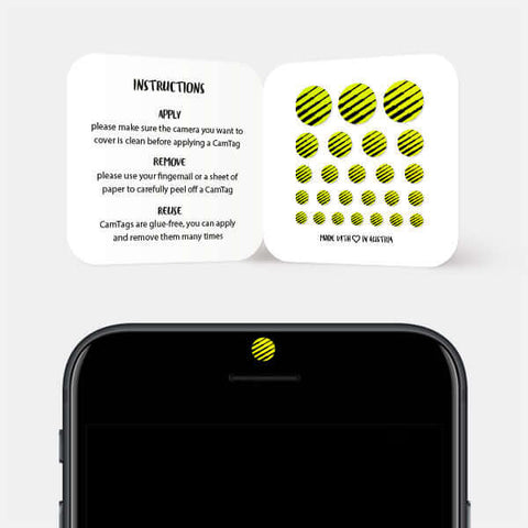 neon yellow "PatternLines1" reusable privacy sticker CamTag on phone