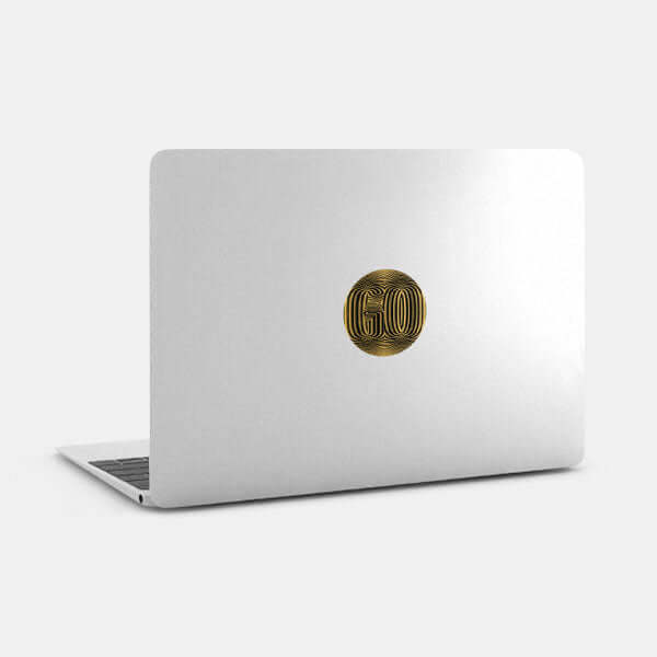 golden go reusable macbook sticker tabtag on a laptop
