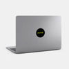 neon yellow "merde" reusable macbook sticker tabtag on a mac