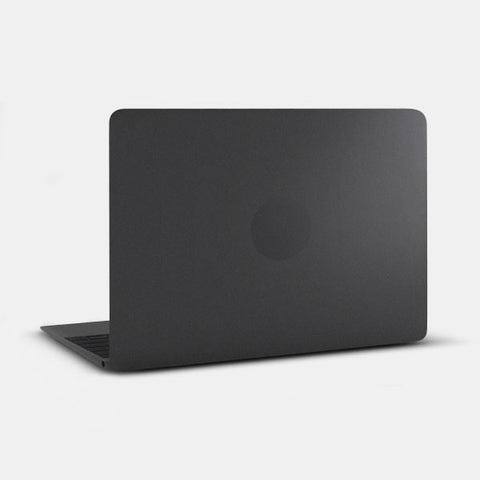 spaceblack "monochrome" reusable macbook sticker tabtag on a laptop