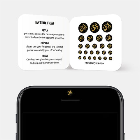 golden "om" reusable privacy sticker CamTag on phone