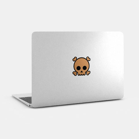 copper "skull" reusable macbook sticker tabtag on a mac