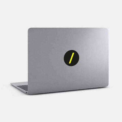 neon yellow "slash" reusable macbook sticker tabtag on a laptop