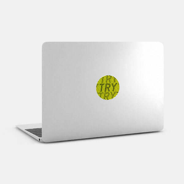 neon yellow try reusable macbook sticker tabtag on a laptop