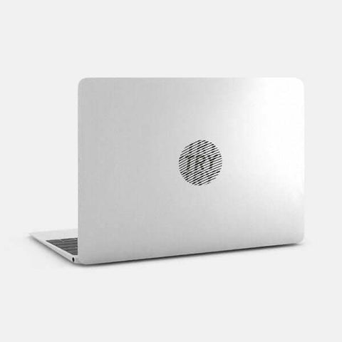 silver "try" reusable macbook sticker tabtag on a laptop