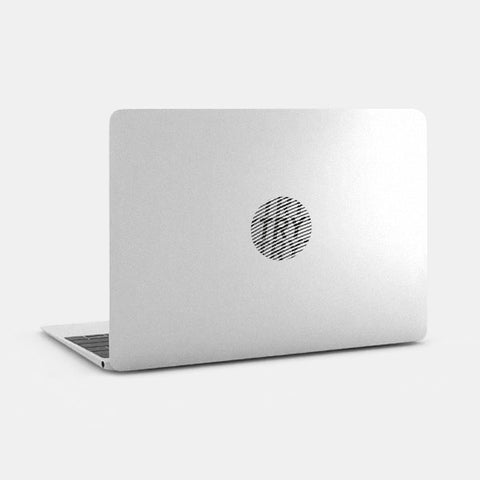 silver "try" reusable macbook sticker tabtag on a laptop