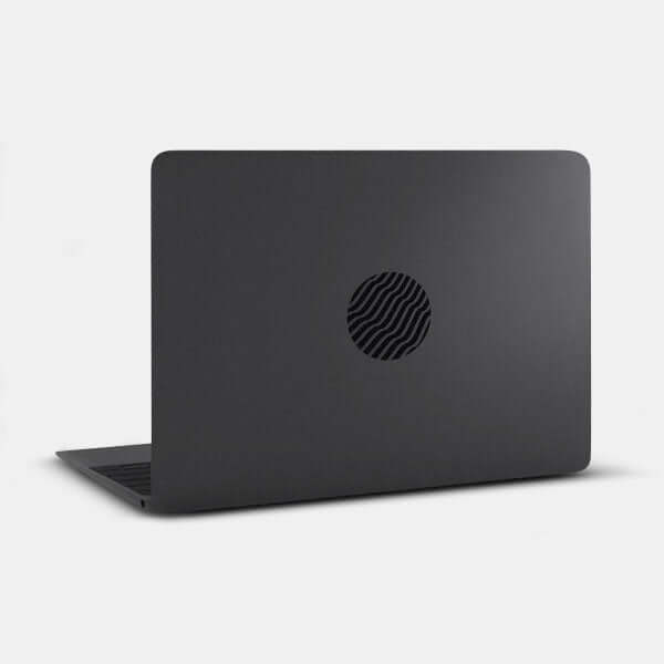 spaceblack wave reusable macbook sticker tabtag on a laptop