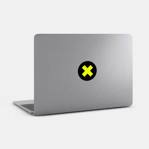 neon yellow "x" reusable macbook sticker tabtag on a mac
