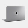 spacegray "Asterisk" reusable macbook sticker tabtag on a laptop