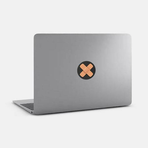 "band-aid" reusable macbook sticker tabtag on a mac by plugyou