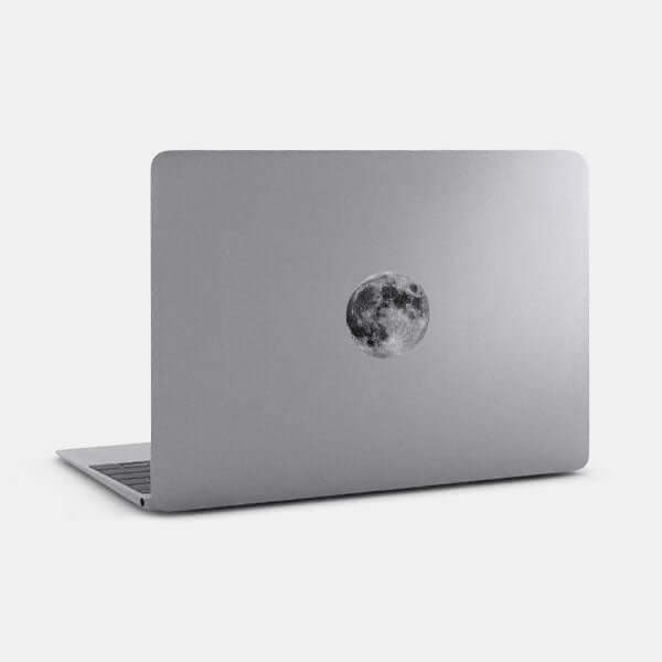 spacegray full moon reusable macbook sticker tabtag on a laptop