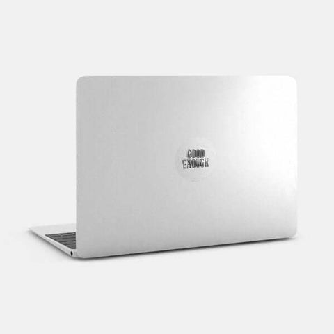 silver "Good Enough" reusable macbook sticker tabtag on a laptop