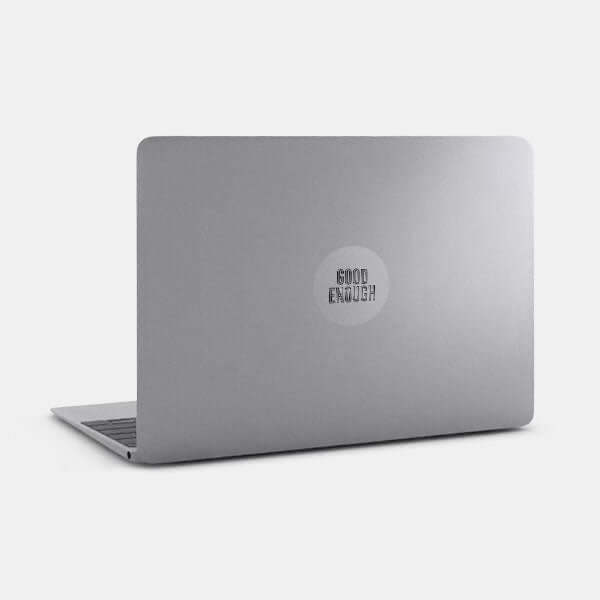 spacegray Good Enough reusable macbook sticker tabtag on a laptop