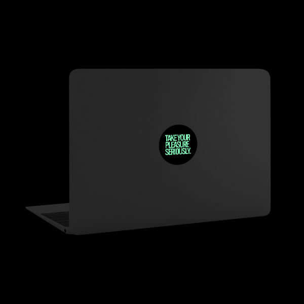 luminescent night take your pleasure seriously reusable macbook sticker tabtag on a laptop