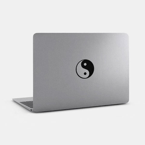 spacegray "YinYang" reusable macbook sticker tabtag on a laptop