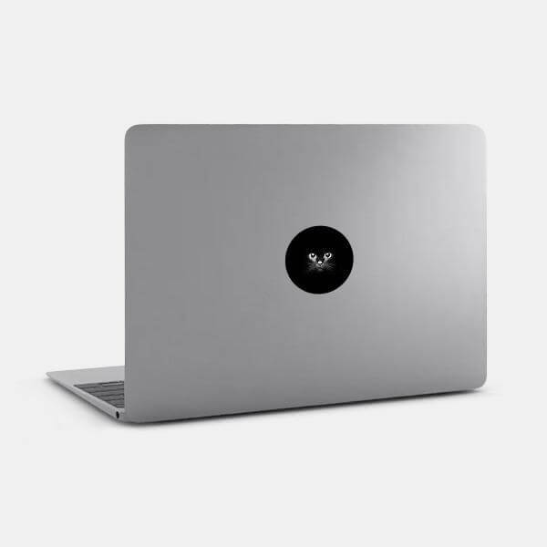 black cat reusable macbook sticker tabtag on a laptop