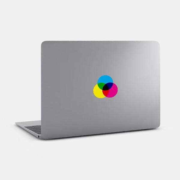 multicolor cmyk reusable macbook sticker tabtag on a laptop
