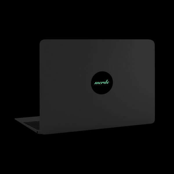 luminescent night merde reusable macbook sticker tabtag on a laptop