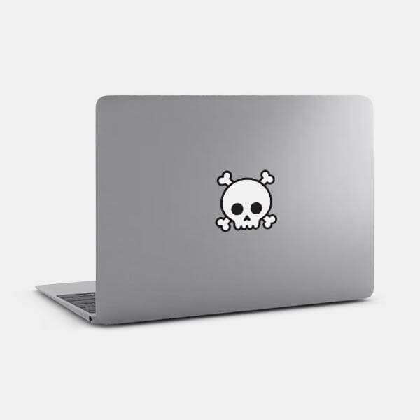 white skull reusable macbook sticker tabtag on a laptop