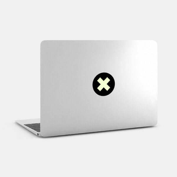 luminescent day x reusable macbook sticker tabtag on a laptop