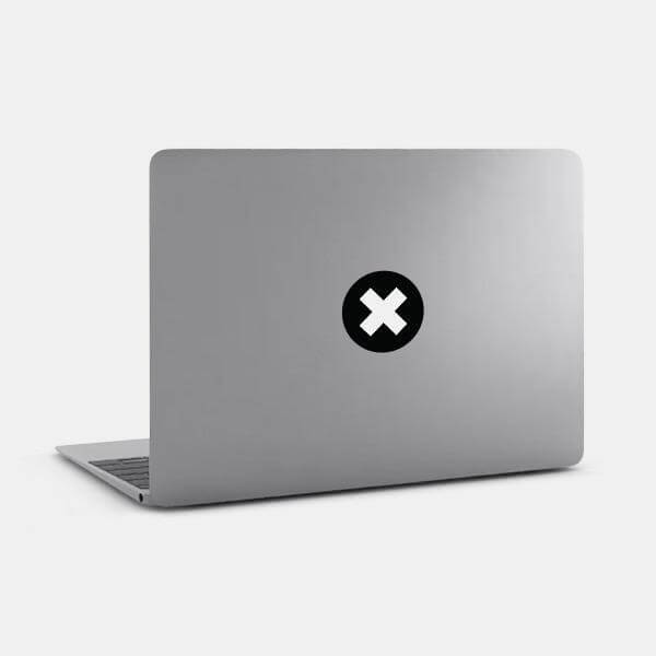 black x tabtag reusable macbook sticker tabtag on a laptop