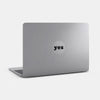 spacegray "yes" reusable macbook sticker tabtag on a laptop